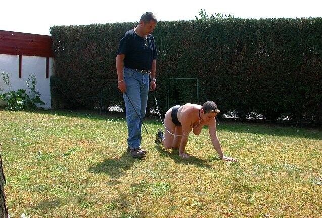Free porn pics of Chienne Mary,a mature sub punished by her master in the garden 1 of 8 pics