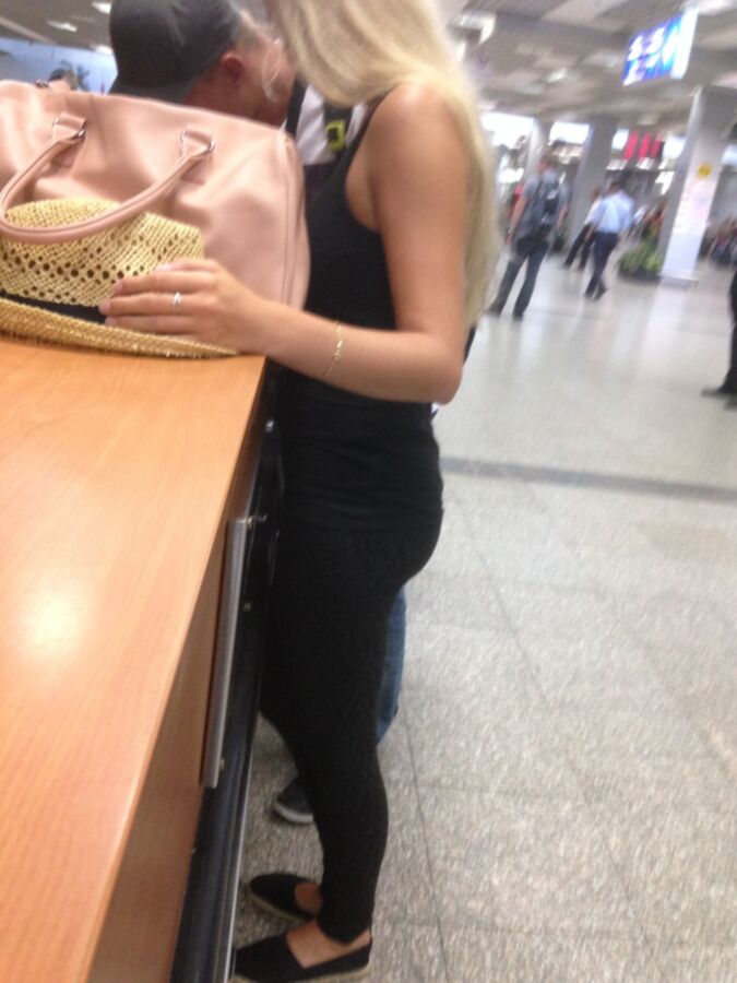 Free porn pics of new nice blond yogapant ass teen on airport 1 of 12 pics