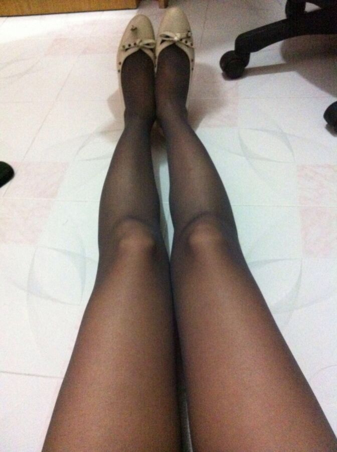 Free porn pics of Trying on new black pantyhose, like it? 3 of 14 pics