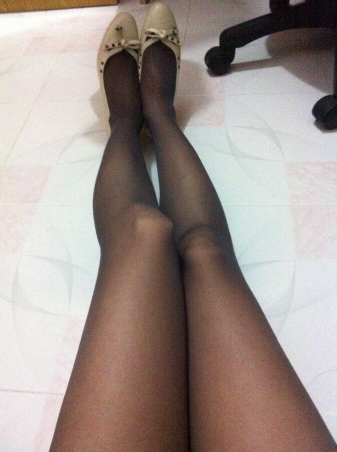 Free porn pics of Trying on new black pantyhose, like it? 4 of 14 pics
