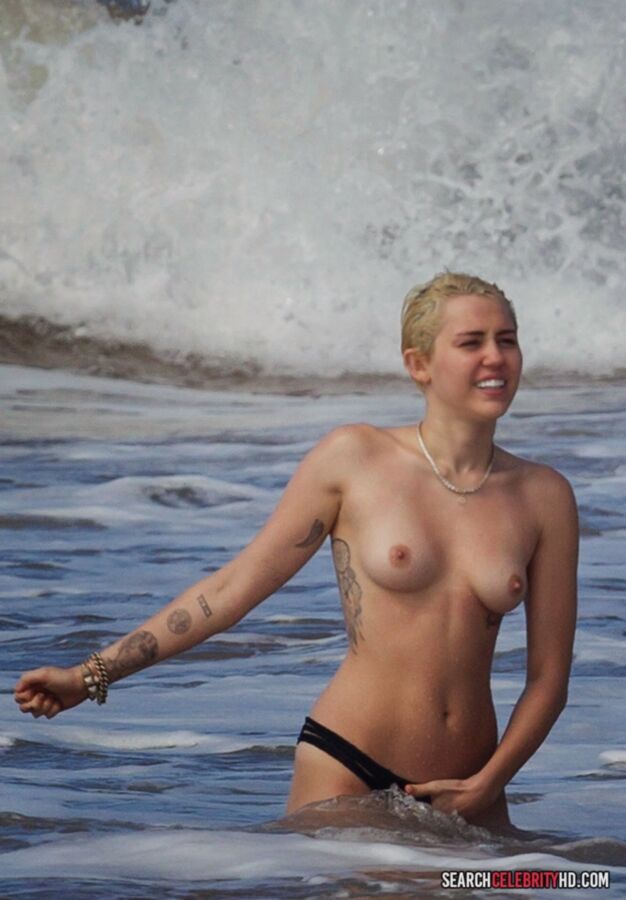 Free porn pics of  Miley Cyrus Topless Bikini Candids In Hawaii 13 of 25 pics