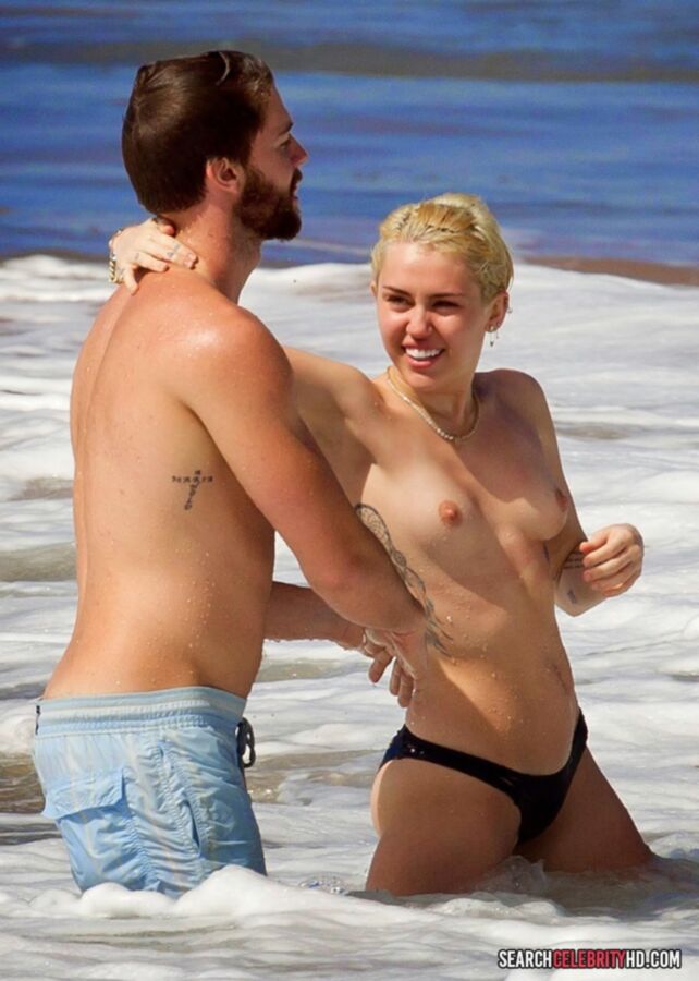 Free porn pics of  Miley Cyrus Topless Bikini Candids In Hawaii 4 of 25 pics