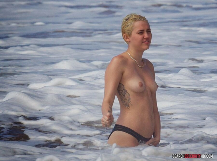 Free porn pics of  Miley Cyrus Topless Bikini Candids In Hawaii 22 of 25 pics