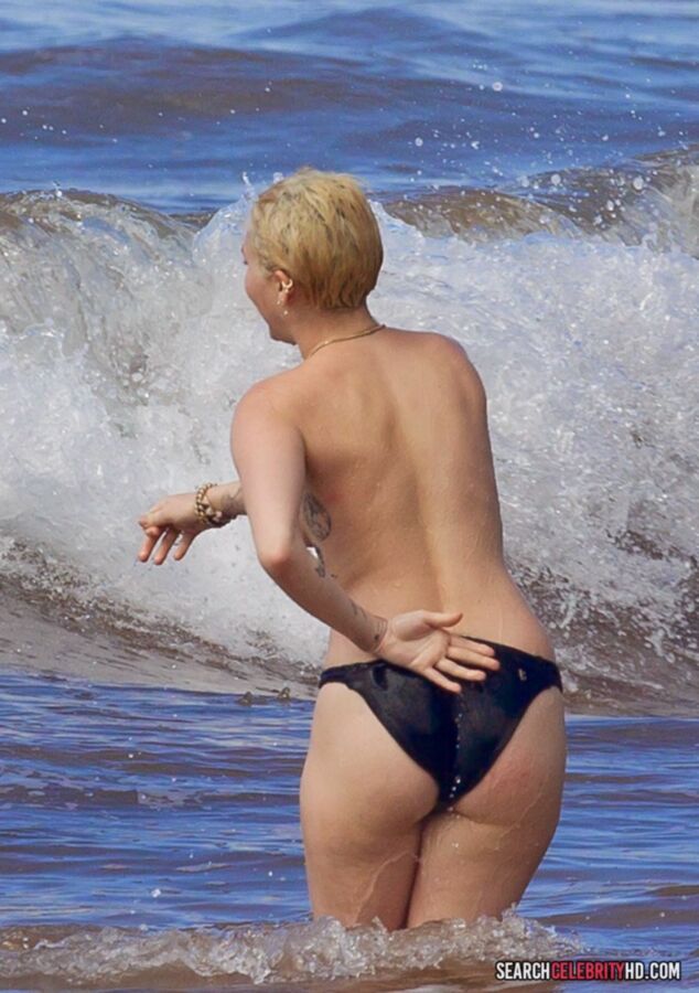 Free porn pics of  Miley Cyrus Topless Bikini Candids In Hawaii 9 of 25 pics
