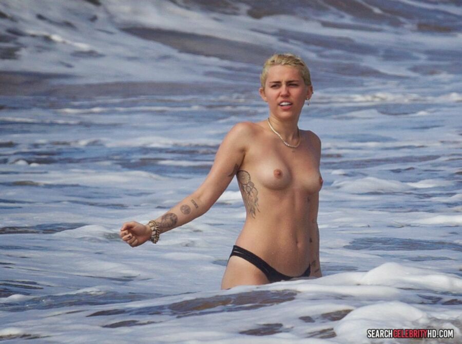 Free porn pics of  Miley Cyrus Topless Bikini Candids In Hawaii 23 of 25 pics