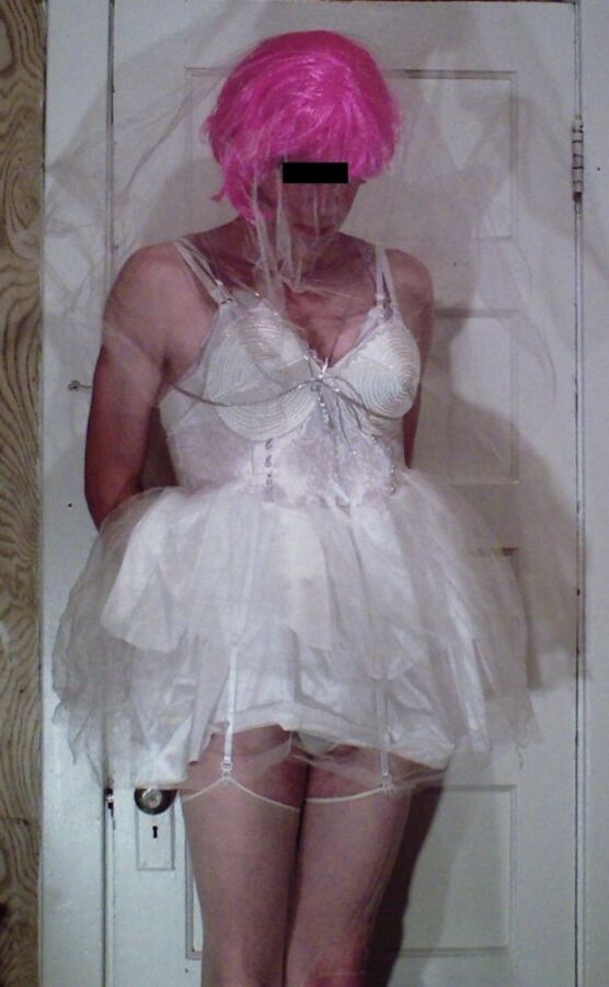Free porn pics of Crossdresser in various outfits, including wedding dress 11 of 26 pics