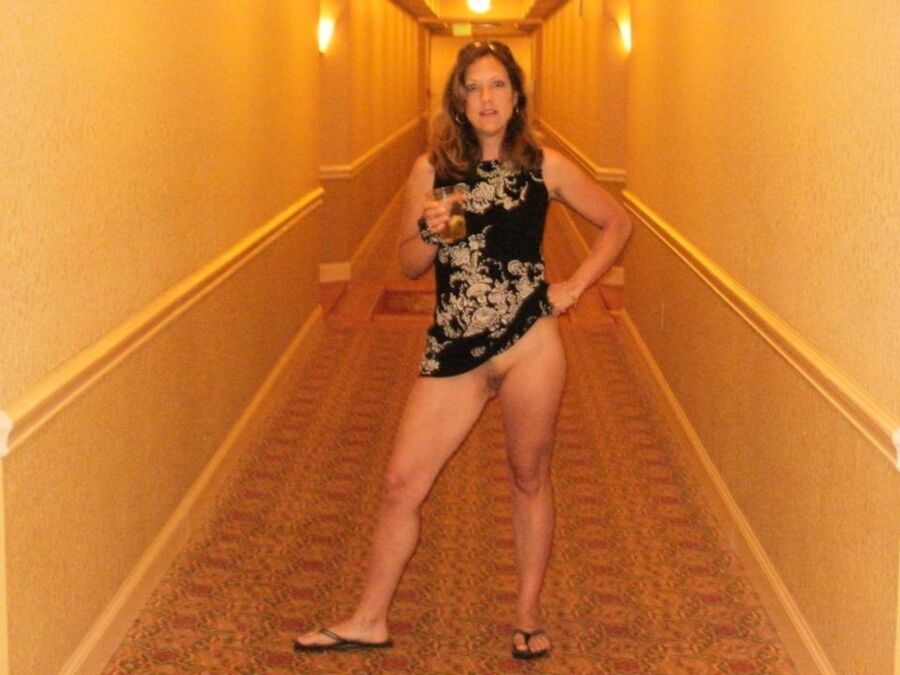 Free porn pics of Fetish - Public places - Babes flashing/naked in hotel corridor 6 of 34 pics