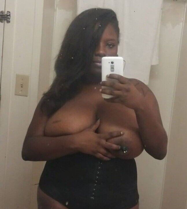 Free porn pics of stupid black whore with big tits 2 of 5 pics