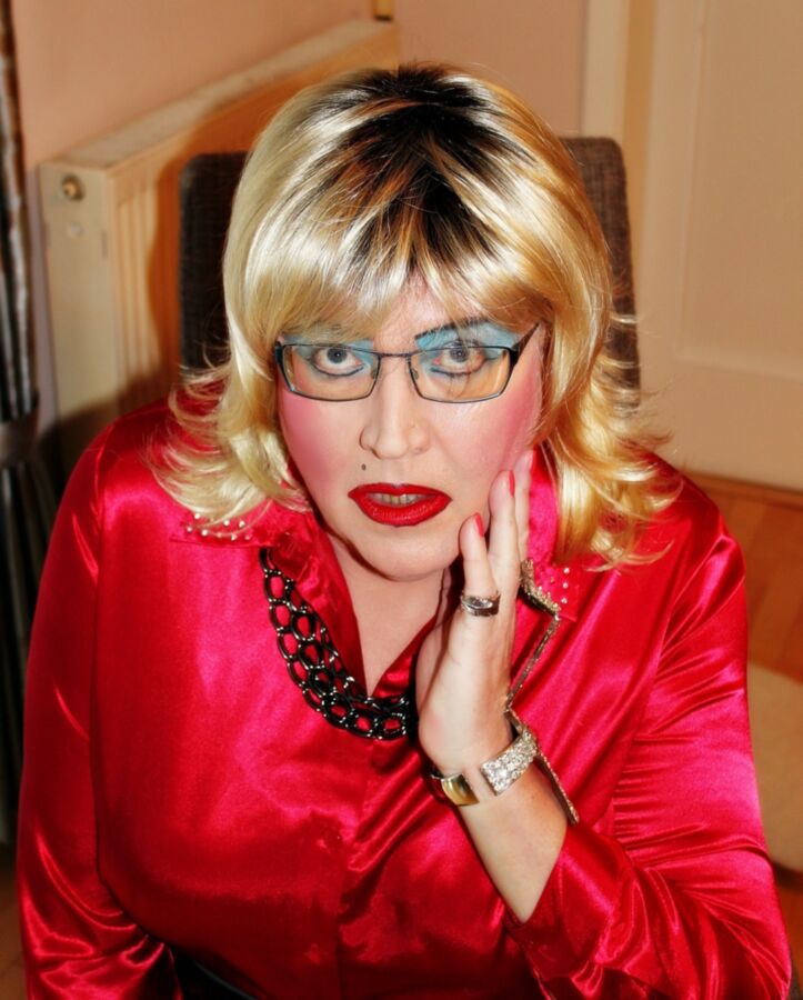 Free porn pics of Mature Tranny in red satin blouse 15 of 15 pics