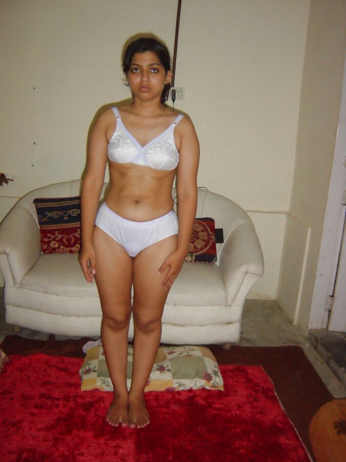 Free porn pics of Indian teen strip 2 of 5 pics