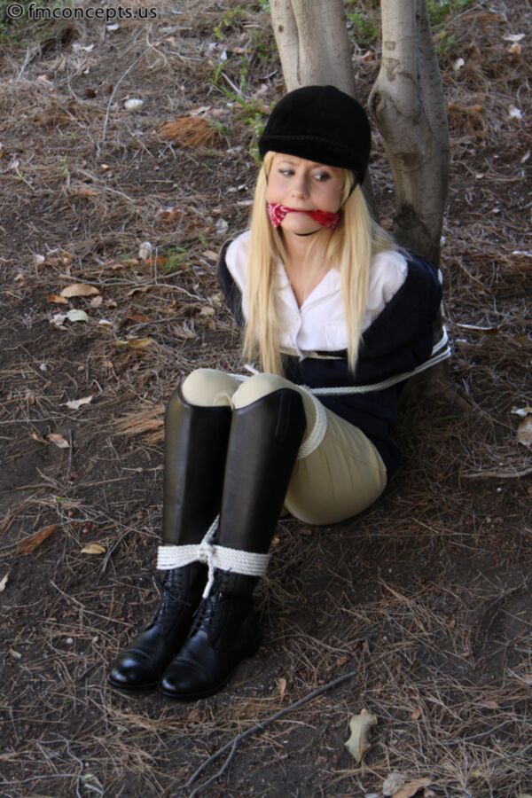 Free porn pics of Cute horse girl tied to a tree 5 of 30 pics