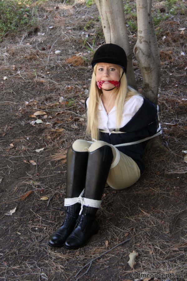 Free porn pics of Cute horse girl tied to a tree 2 of 30 pics