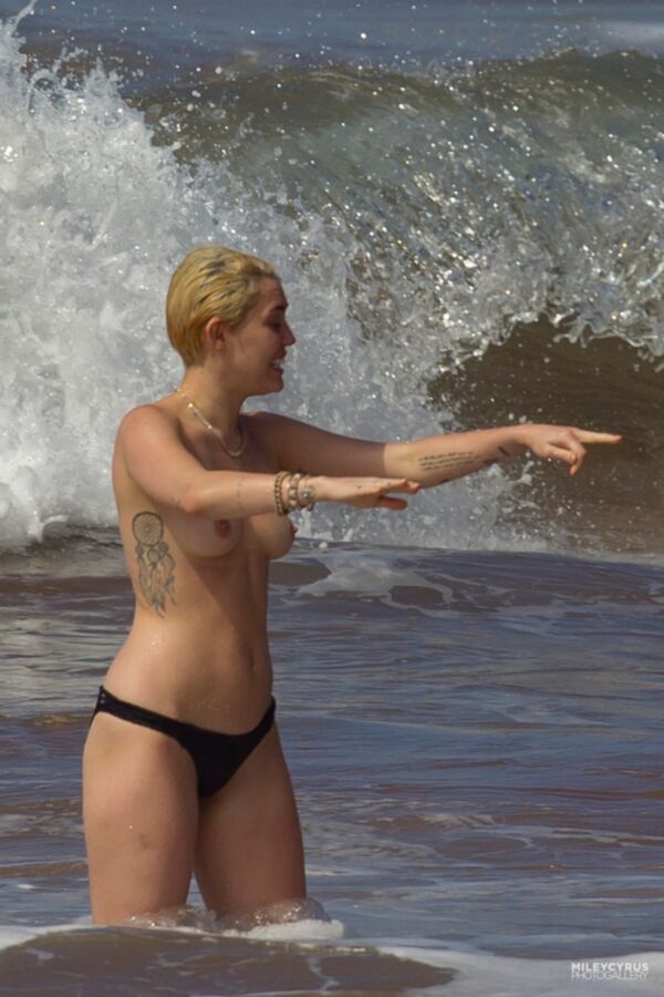 Free porn pics of Miley Cyrus Topless In Maui 24 of 37 pics