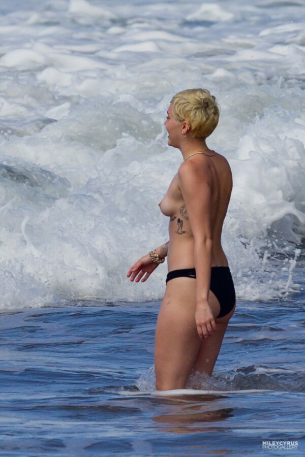 Free porn pics of Miley Cyrus Topless In Maui 17 of 37 pics