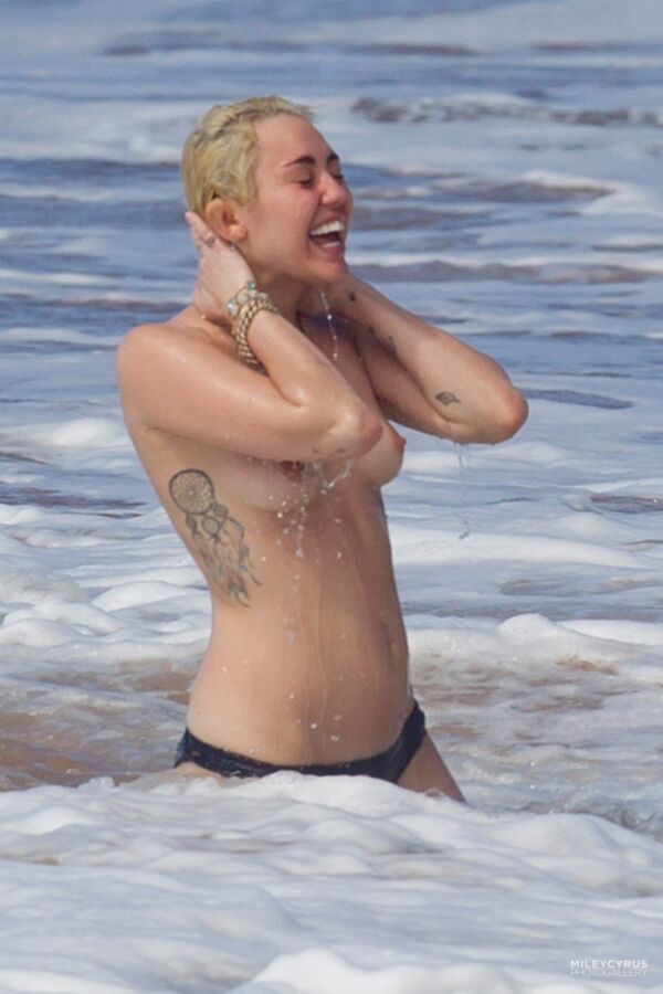 Free porn pics of Miley Cyrus Topless In Maui 19 of 37 pics