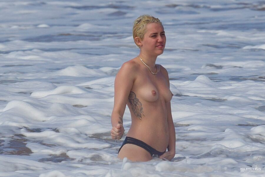 Free porn pics of Miley Cyrus Topless In Maui 9 of 37 pics