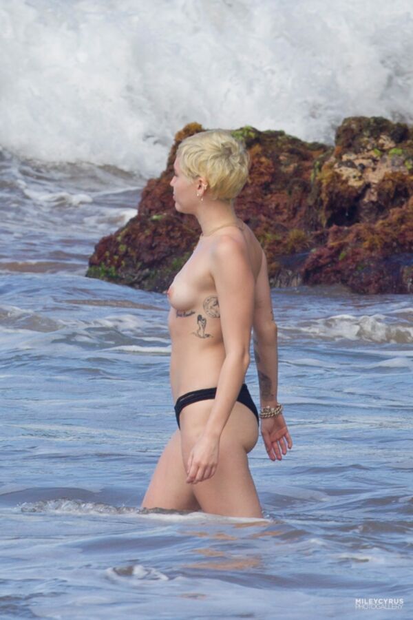 Free porn pics of Miley Cyrus Topless In Maui 4 of 37 pics