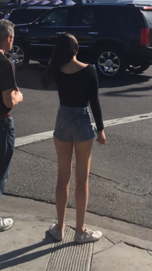 Free porn pics of Hot teen with AMAZING ass and legs walking around Hollywood 2 of 4 pics