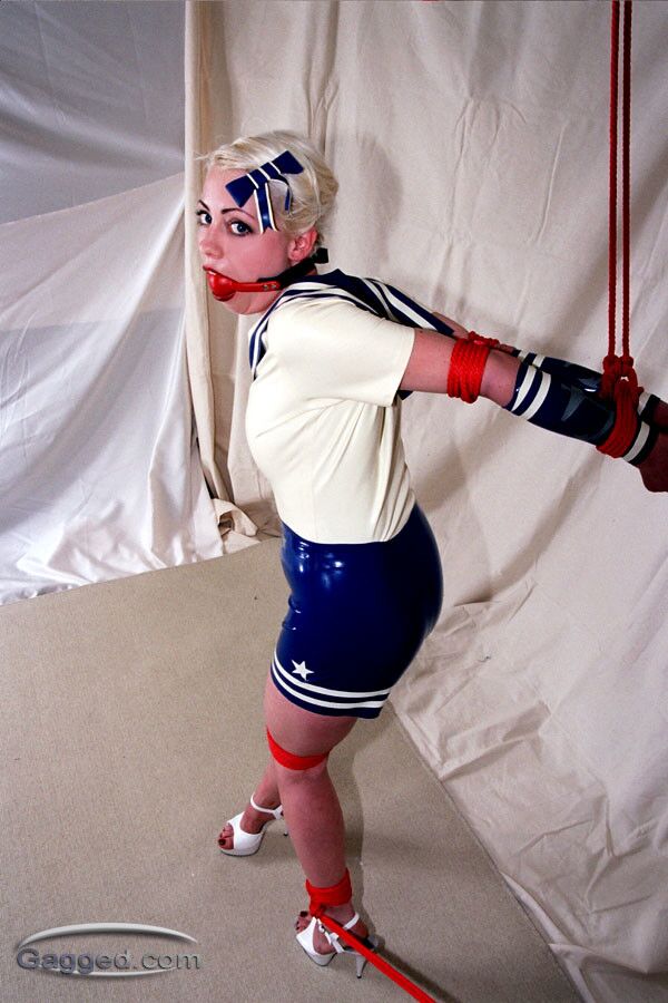 Free porn pics of Bound And Gagged Latex Blonde 22 of 35 pics