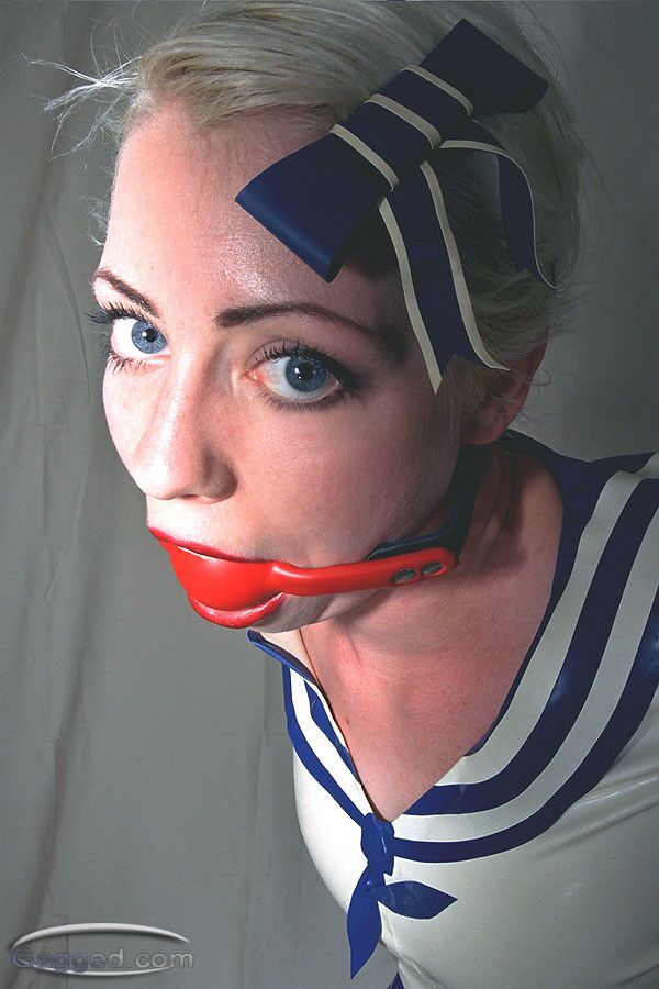 Free porn pics of Bound And Gagged Latex Blonde 18 of 35 pics