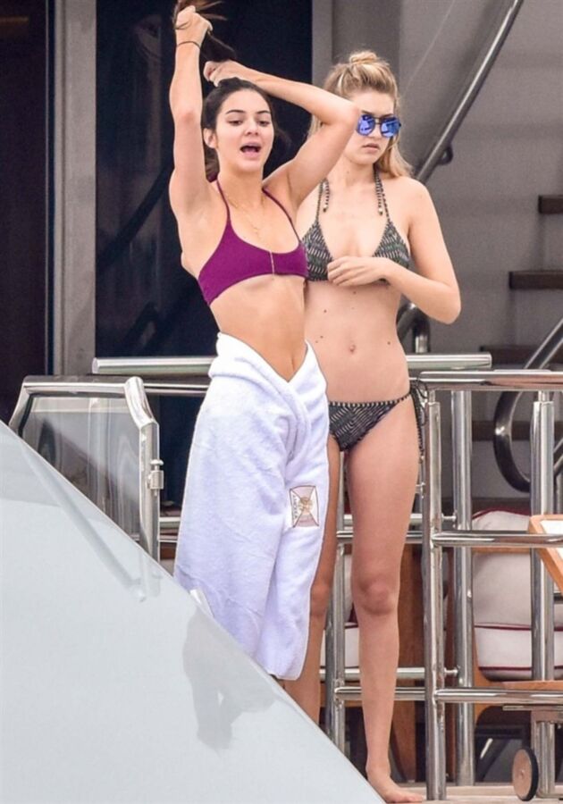 Free porn pics of KENDALL JENNER & GIGI HADID IN THONG BIKINIS ON A YACHT 5 of 12 pics