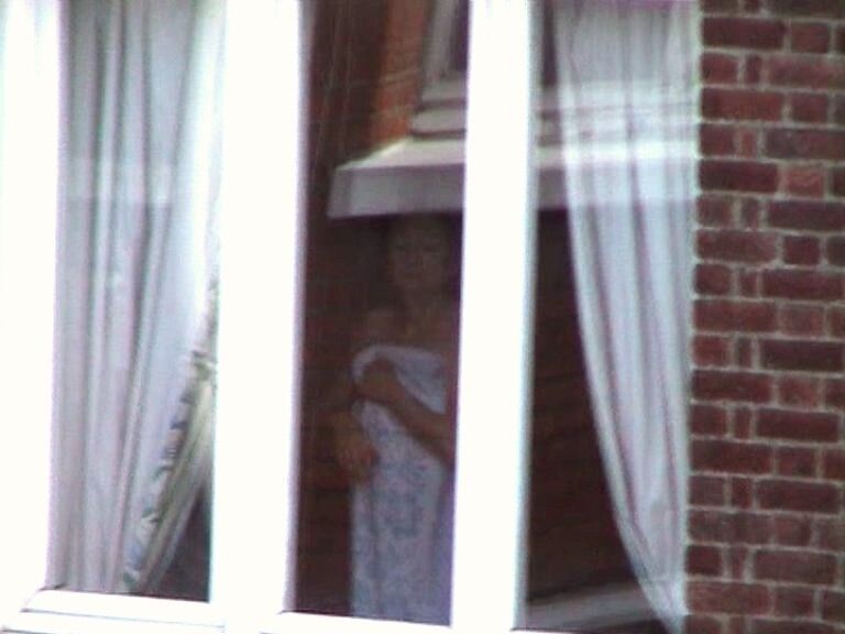 Free porn pics of Voyeur : My old Neighboor naked at the window ! 9 of 25 pics