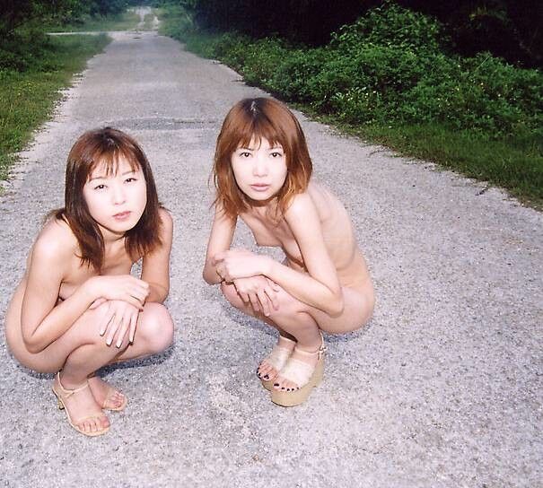 Free porn pics of Two Japanese babes nude outdoors 19 of 61 pics
