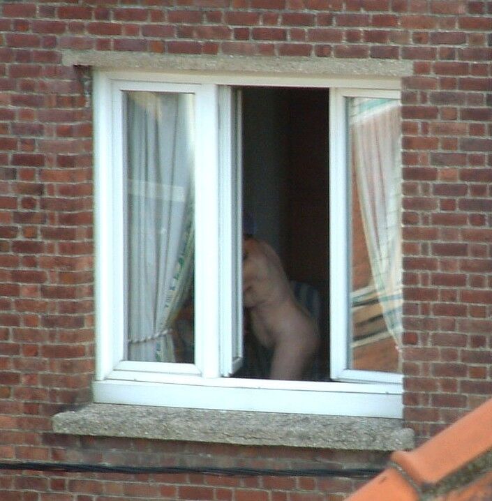 Free porn pics of Voyeur : My old Neighboor naked at the window ! 6 of 25 pics