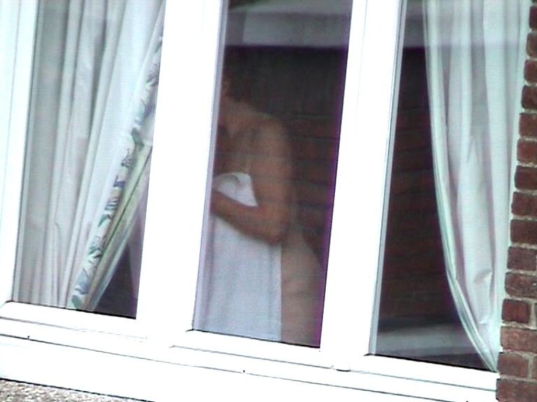 Free porn pics of Voyeur : My old Neighboor naked at the window ! 17 of 25 pics