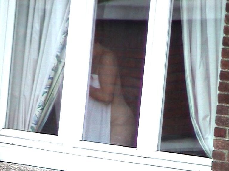 Free porn pics of Voyeur : My old Neighboor naked at the window ! 19 of 25 pics