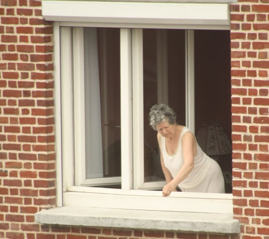 Free porn pics of Voyeur : My old Neighboor naked at the window ! 5 of 25 pics