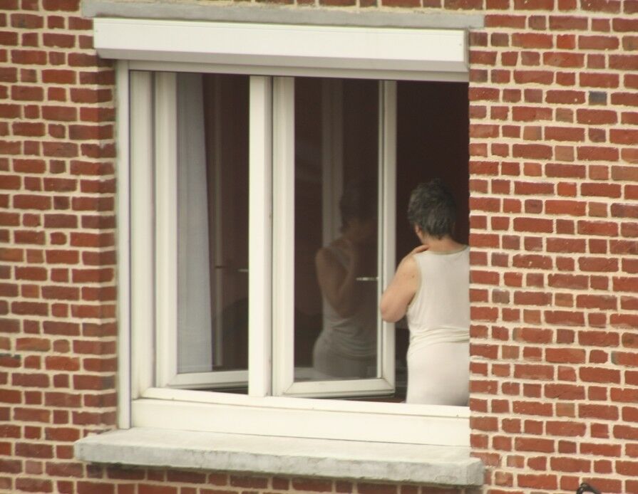 Free porn pics of Voyeur : My old Neighboor naked at the window ! 8 of 25 pics
