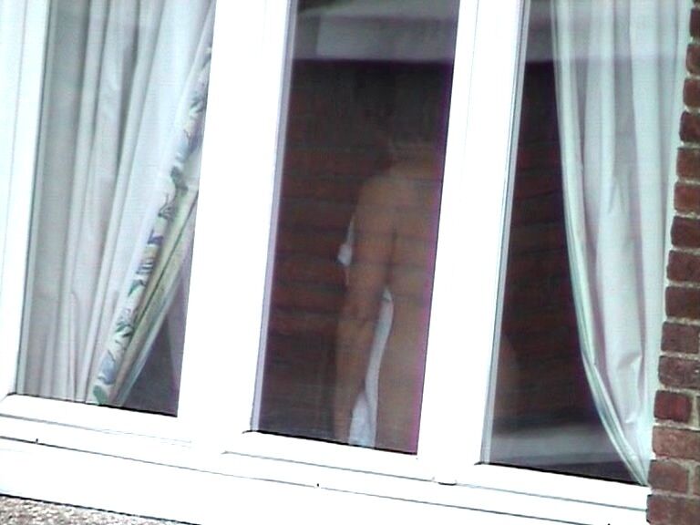 Free porn pics of Voyeur : My old Neighboor naked at the window ! 20 of 25 pics