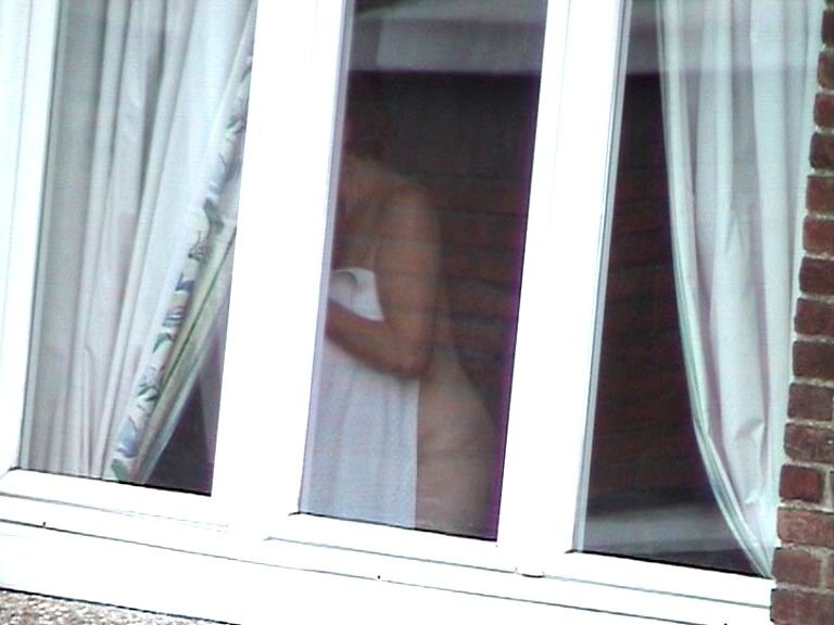 Free porn pics of Voyeur : My old Neighboor naked at the window ! 18 of 25 pics