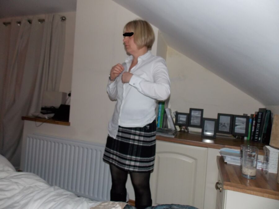 Free porn pics of Sexy wife Anna in boots, opaque tights and short skirt 7 of 7 pics