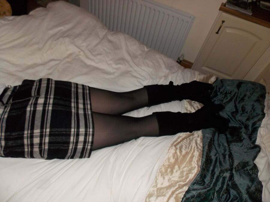 Free porn pics of Sexy wife Anna in boots, opaque tights and short skirt 1 of 7 pics