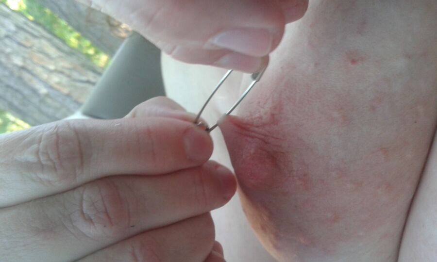 Free porn pics of safety pin through the nipple of a floppy tit 4 of 4 pics