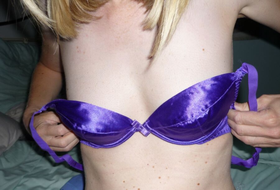 Free porn pics of Slut strips from her shiny bra 1 of 12 pics