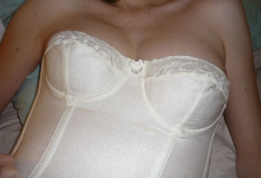 Free porn pics of Sexy cleavage in a white CORSET 18 of 20 pics