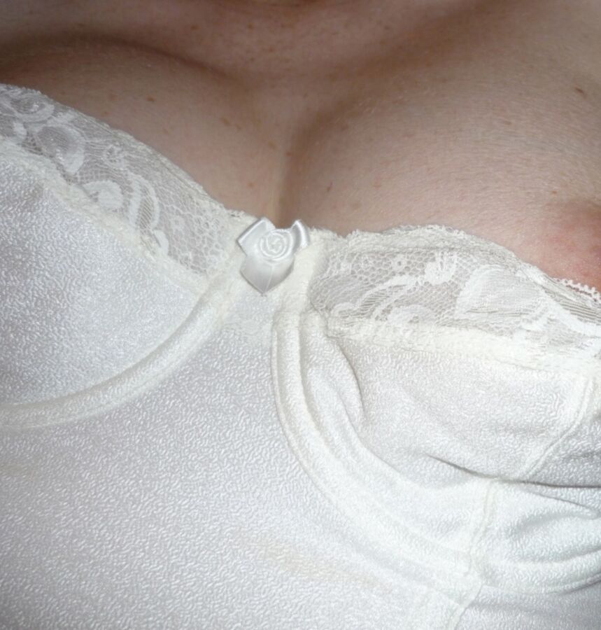 Free porn pics of Sexy cleavage in a white CORSET 20 of 20 pics