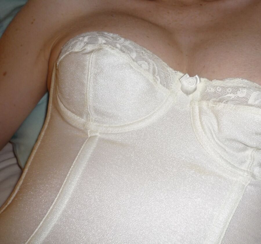Free porn pics of Sexy cleavage in a white CORSET 19 of 20 pics