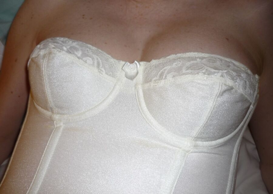 Free porn pics of Sexy cleavage in a white CORSET 17 of 20 pics
