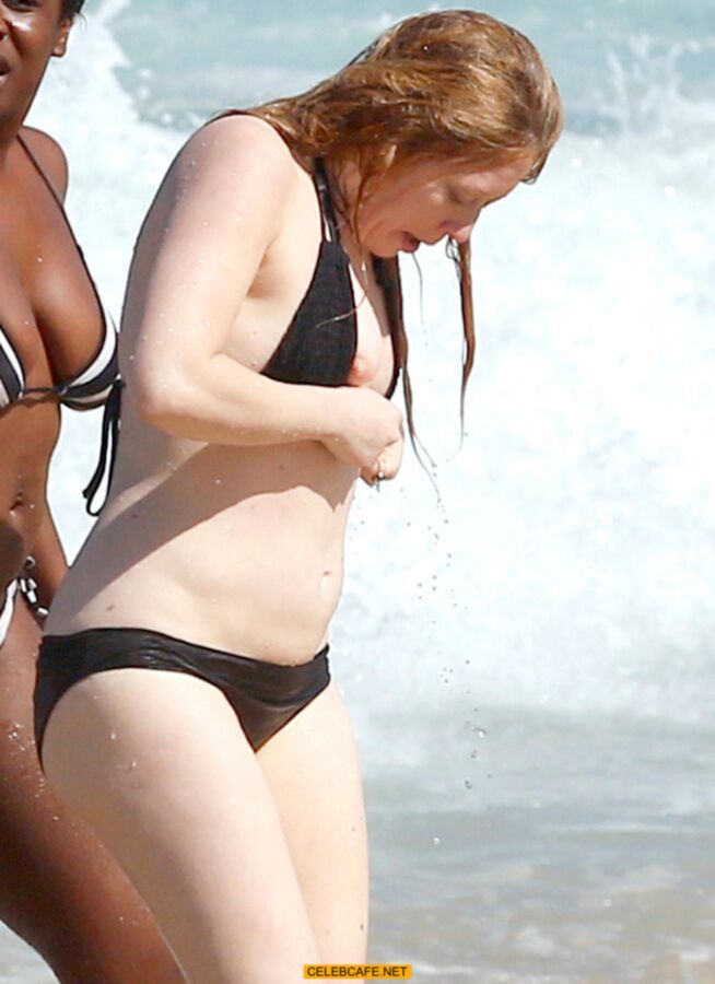 Free porn pics of Celebrity Natasha Lyonne nipple slip at the beach  3 of 7 pics