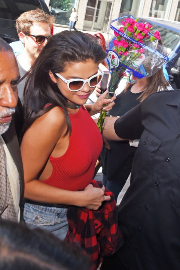 Free porn pics of Selena Gomez Beautiful breast in a red blouse 24 of 28 pics