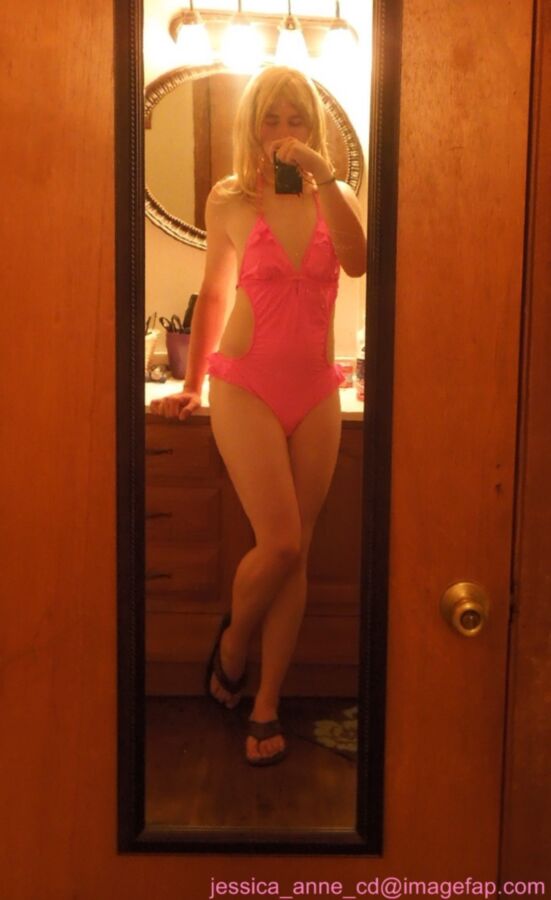 Free porn pics of New pink one-piece swimsuit 1 of 7 pics
