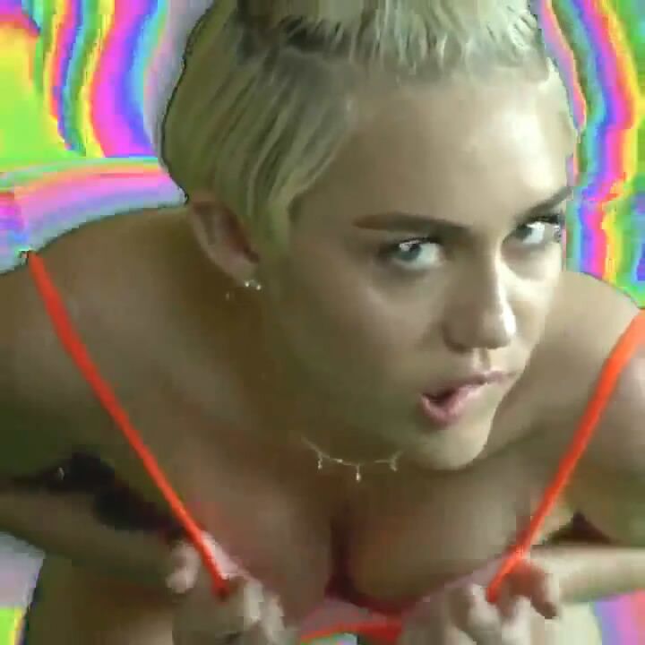 Free porn pics of Miley Cyrus sexy Vidoe Caps 22 of 32 pics